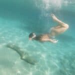 Girl Diving in Crystal Clear Adriatic Sea: Embracing Serenity Beneath the Waves