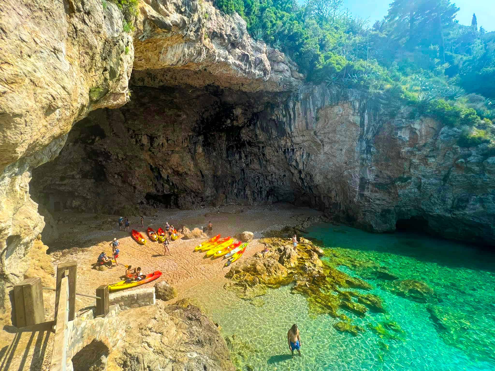 Betina cave in Dubrovnik old city area with kayaks visiting the cave