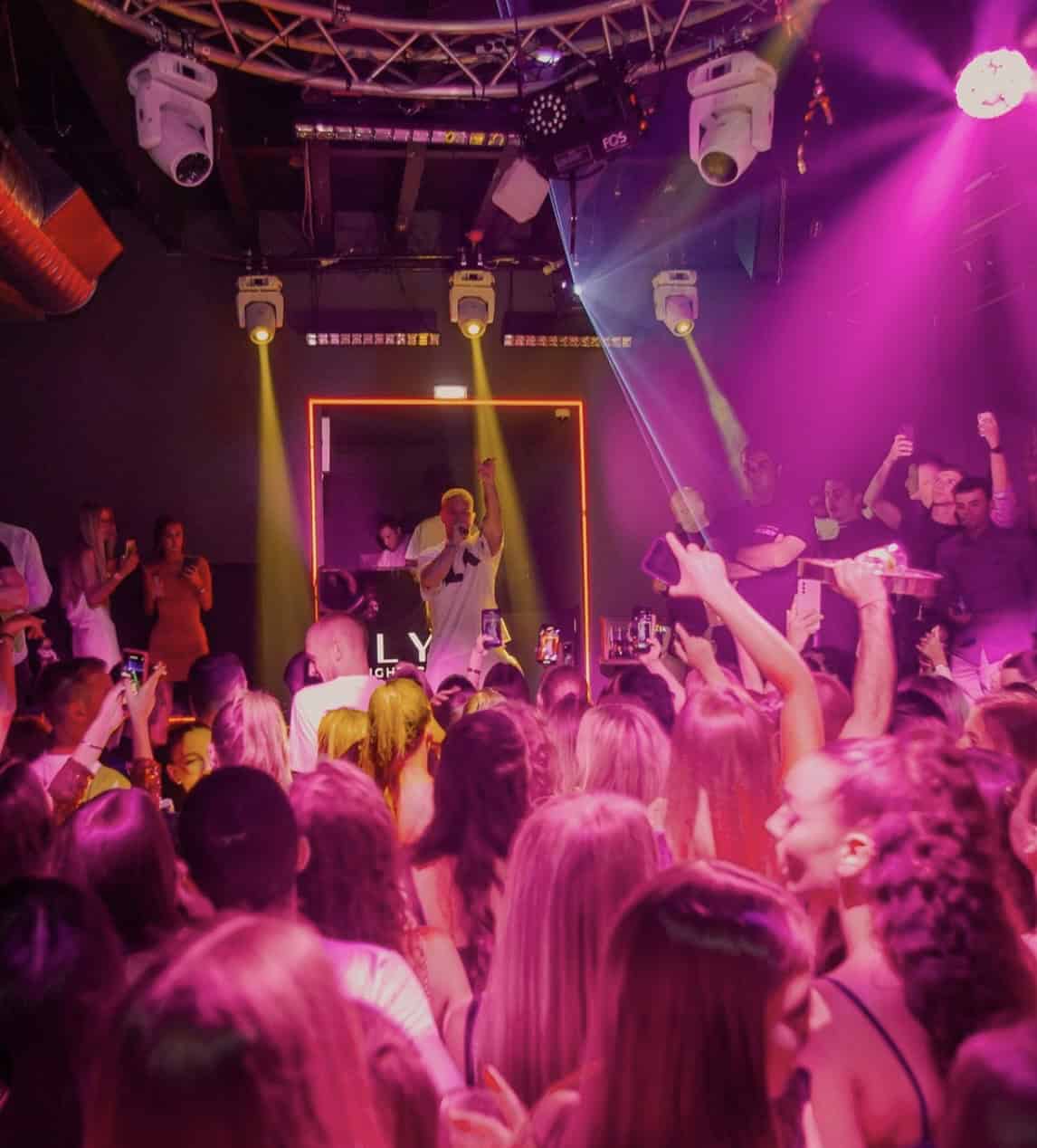 A DJ performing at Elyx Club Dubrovnik, with a vibrant crowd and upscale atmosphere in the heart of the Old Town.