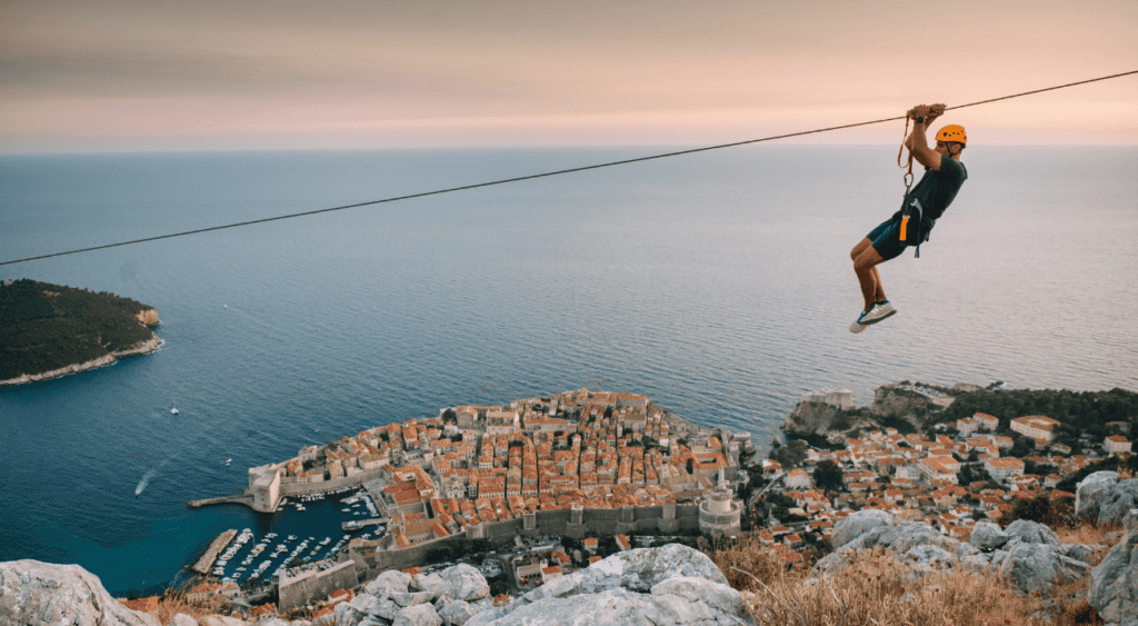 A thrilling ride on the Panorama Zipline Dubrovnik, offering stunning aerial views of the Adriatic Sea and Dubrovnik’s historic skyline.